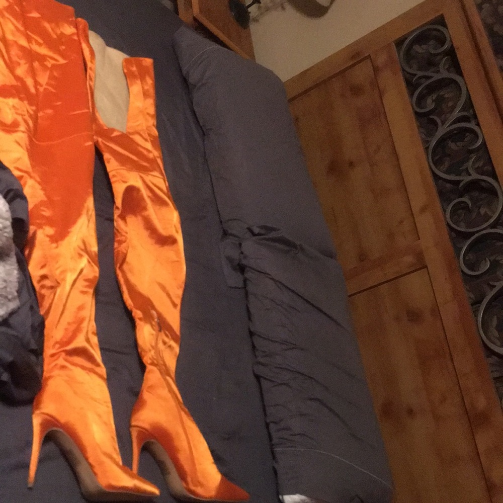 Long long orange thigh high boots